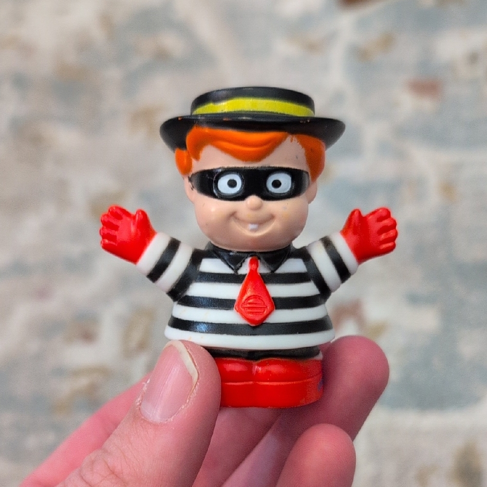 Bandit Striped Toy Figure with Red and Black Accents